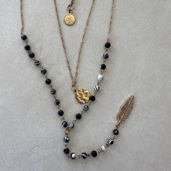Jessica Simpson Jewelry - Jessica Simpson signed gold boho feather black white beaded extra long necklace